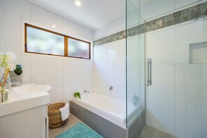Shower, hair dryer, towels, soap
