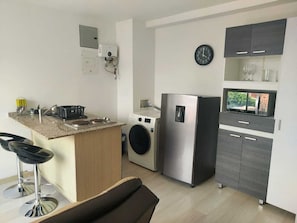 Apartment, City View | Private kitchen | Microwave, stovetop, rice cooker, blender