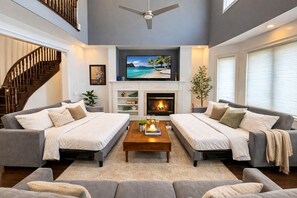 Smart TV, fireplace, books, offices