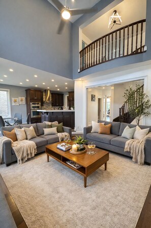 Smart TV, fireplace, books, offices