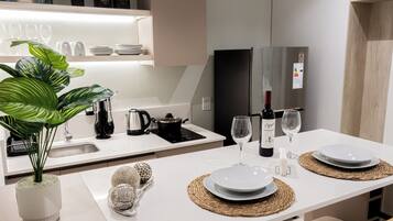 Microwave, electric kettle, cookware/dishes/utensils