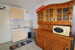 Fridge, microwave, toaster, cookware/dishes/utensils