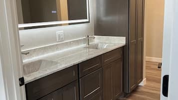 Shower, towels, soap, toilet paper