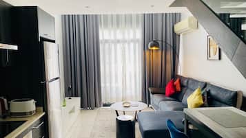 Exclusive-Apartment, 1 Schlafzimmer, Balkon | Wohnbereich