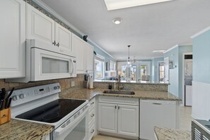 Fridge, microwave, oven, stovetop - "Waters Edge 431-C" - Oceanfront Condo w/ Community Pool, 2 Bedrooms / 2 Bathrooms (Holden Beach)