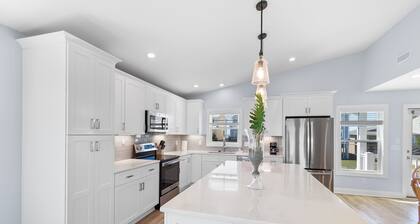 "Salty Sunsets" is a 3 Bedroom.3.5 Bathroom Second Row with Marsh View