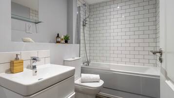 Hair dryer, towels, soap, shampoo