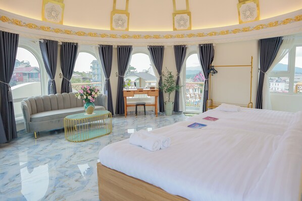 Luxe vierpersoonskamer | Woonruimte