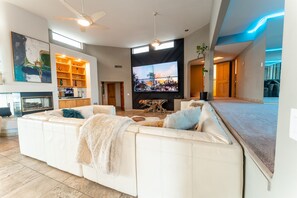 Smart TV, fireplace, table tennis, books