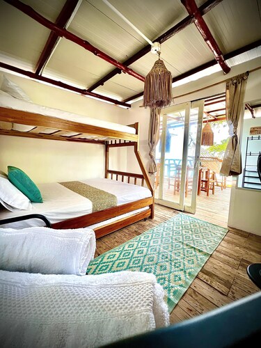 Escape to Paradise! Ocean front room at Shekina Club House - Baru