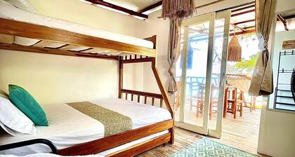 Escape to Paradise! Ocean front room at Shekina Club House - Baru