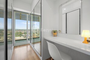 Apartment, 3 Bedrooms, City View | Laptop workspace, iron/ironing board, free WiFi