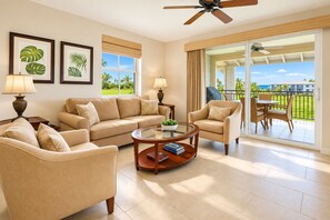 Your living room opens directly to the lanai, with comfortable seating and golf course views bringing the outdoors into everyday use. HLI-12A - Halii Kai | Ocean View 5 BR, Sleeps 14 | Car Incl. w/ 6+ Nights | HLI ML-1293 by KBM (Waikoloa)
