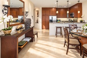 Full size appliances and generous wood cabinetry give your kitchen practical space for meals, with an open flow into the dining room. HLI-12A