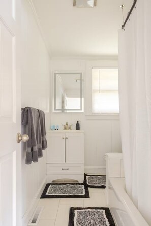 Hair dryer, towels, soap, toilet paper