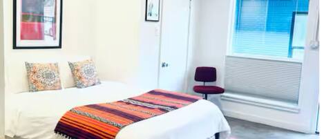 1 غرفة نوم ومكواة/لوح كي وواي فاي وملاءات أسرّة