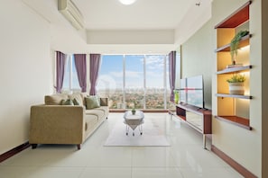 Apartamento, 2 quartos, vista para a cidade | Área de estar