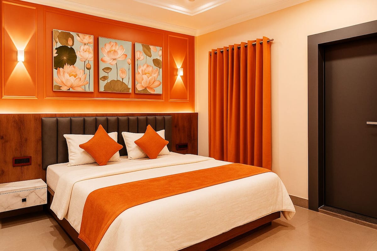 A hotel room with a large bed, a wooden headboard, two wall-mounted light fixtures, and a door with a curtain.