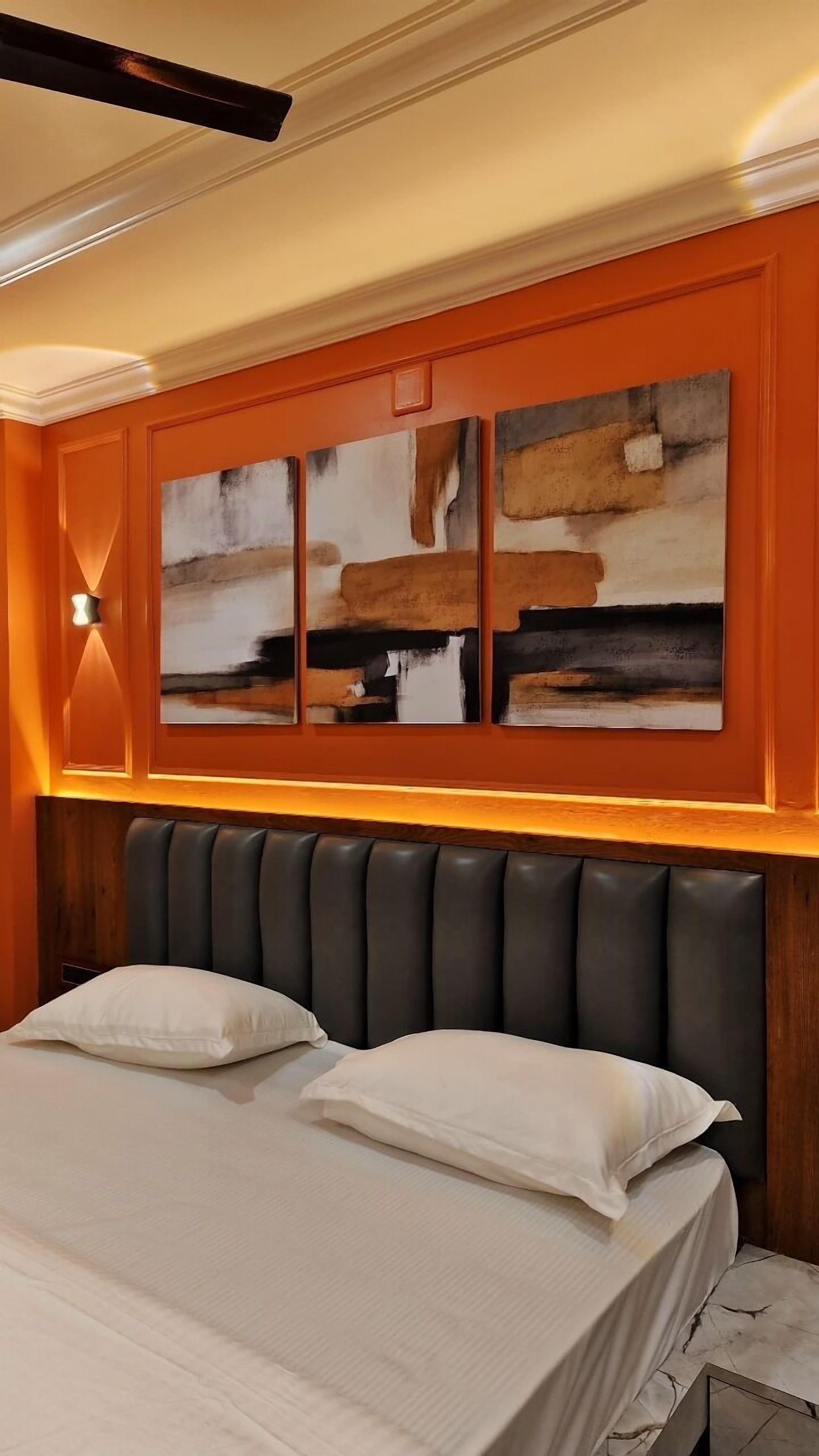 デラックス ルーム | 高級寝具、低反発ベッド、デスク、WiFi (無料)