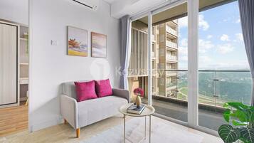 Apartment, 3 Bedrooms, City View | Living area | 43-inch Smart TV with cable channels, Netflix, streaming services