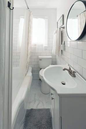 Regadera y secadora de cabello 