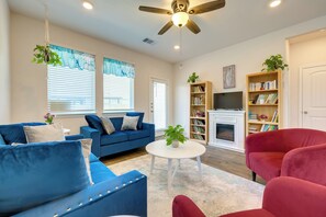 TV, fireplace, books