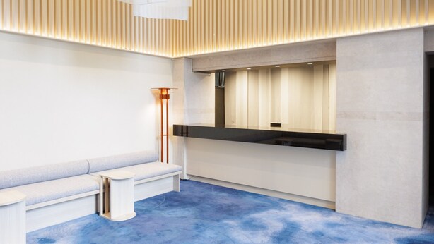 A modern reception area with a wooden ceiling, a reception desk, and a seating area. - HOTEL AMANEK Asakusa Sakurabashi (Tokyo)