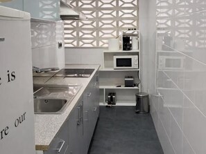Fridge, microwave, coffee/tea maker, toaster