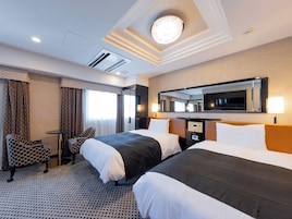 Deluxe Twin Room, Non Smoking | Down comforters, desk, blackout drapes, free WiFi