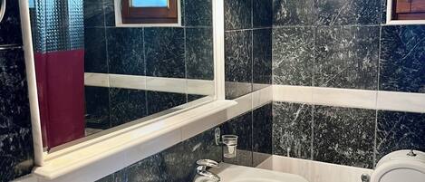 Shower, free toiletries, hair dryer, towels