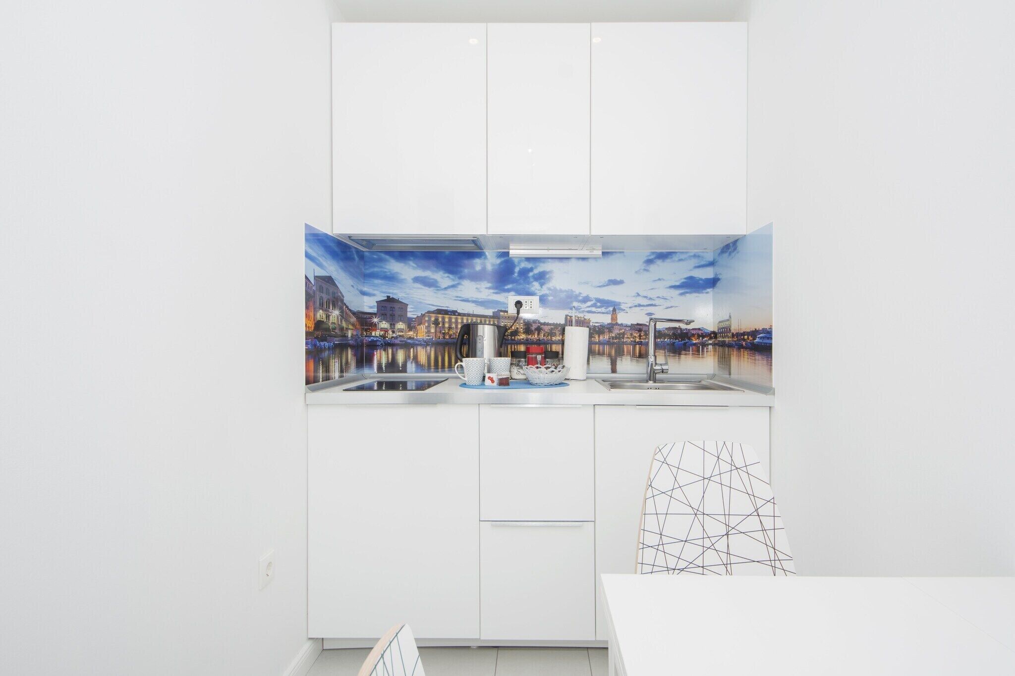 Fridge, microwave, stovetop, dining tables