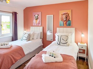 4 bedrooms, desk, iron/ironing board, travel crib