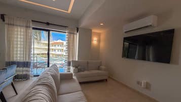 Appartement Deluxe | Coin séjour | TV connectée