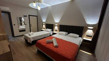 Triple Room, Balcony, Mountain View | Minibar, desk, free WiFi