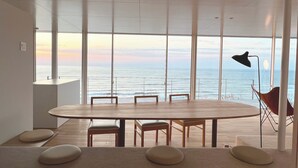 Basic Villa, Ocean View | Living area | Flat-screen TV - Cliff House MORAI (Ishikari)
