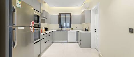 Fridge, stovetop, cookware/dishes/utensils
