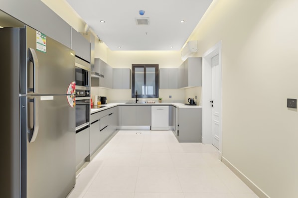 Fridge, stovetop, cookware/dishes/utensils