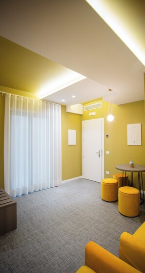 Standard Quadruple Room | Minibar, in-room safe, desk, laptop workspace - Opera Hotel (Gravina in Puglia)