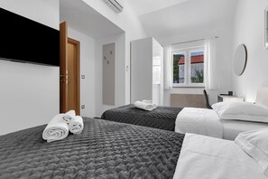 3 dormitorios, tabla de planchar con plancha, wifi gratis y ropa de cama