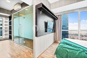 Appartement, 2 chambres, vue ville | Coin séjour | Télévision à écran plat