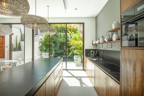 Fridge, microwave, oven, stovetop - Modern 3BR Villa with Enclosed Living & Pool (Kuta Utara)