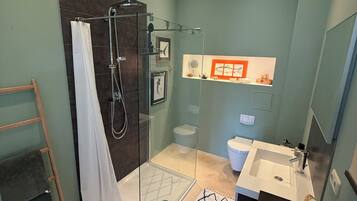 Shower, eco-friendly toiletries, hair dryer, towels