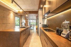 Fridge, microwave, stovetop, coffee/tea maker
