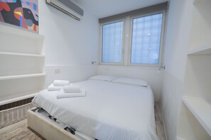 1 habitación, tabla de planchar con plancha, wifi gratis y ropa de cama 