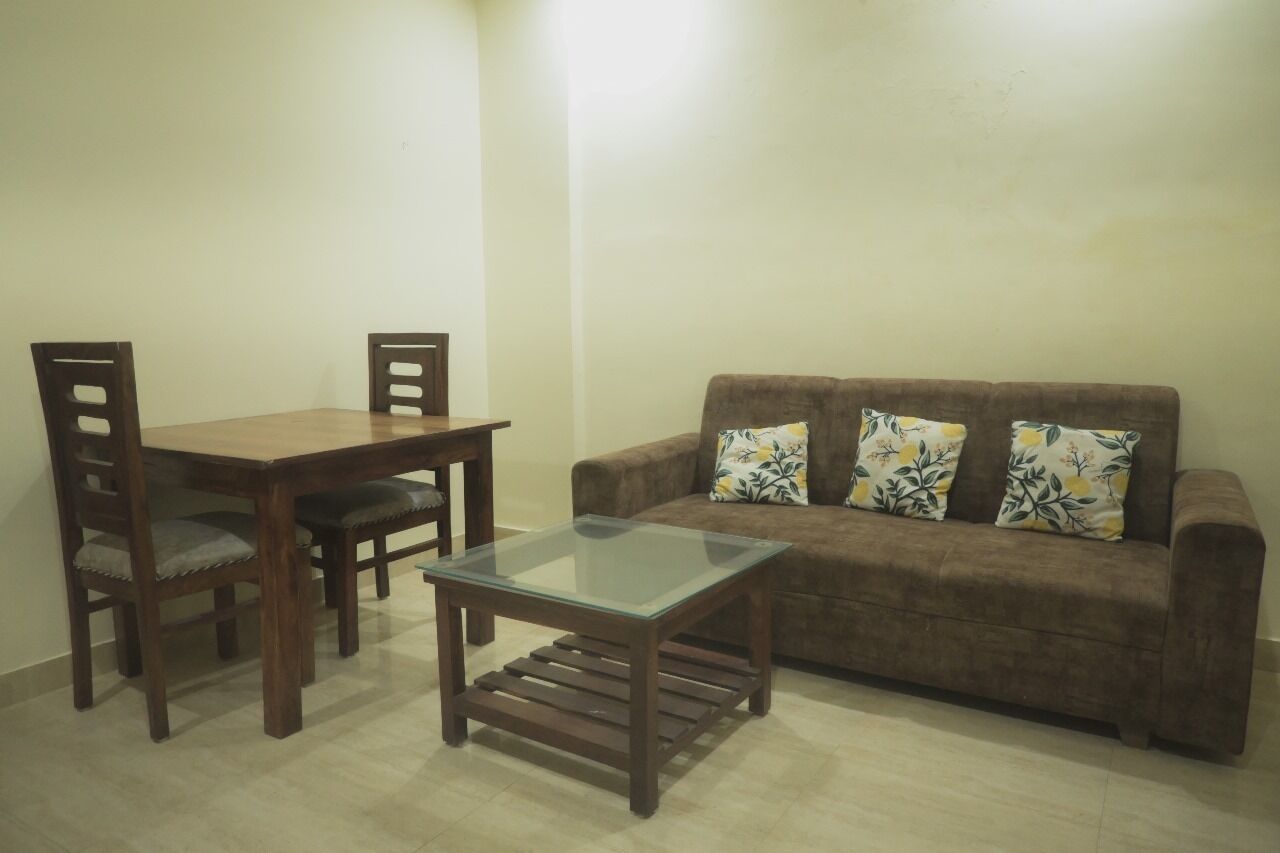 Apartamento Deluxe | Zona de estar