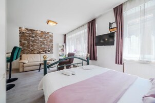 Desk, iron/ironing board, free WiFi, bed sheets