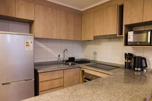 Fridge, microwave, oven, stovetop - Modern 1BR Gem in City Center | Steps to Metro (Unknown)