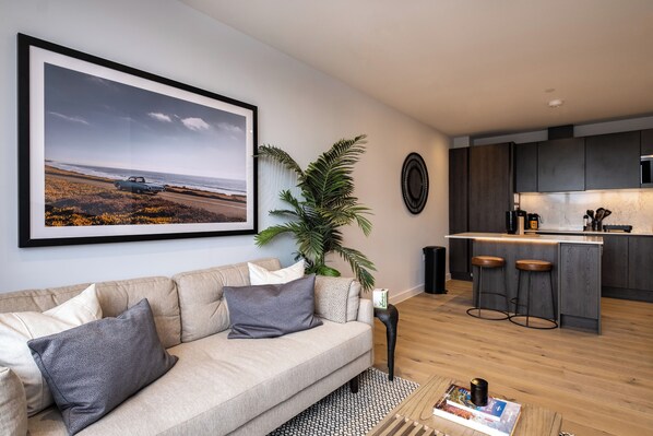 Apartment, 1 King Bed | Living area | Flat-screen TV