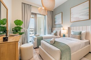 2 chambres, coffres-forts dans les chambres, fer et planche à repasser