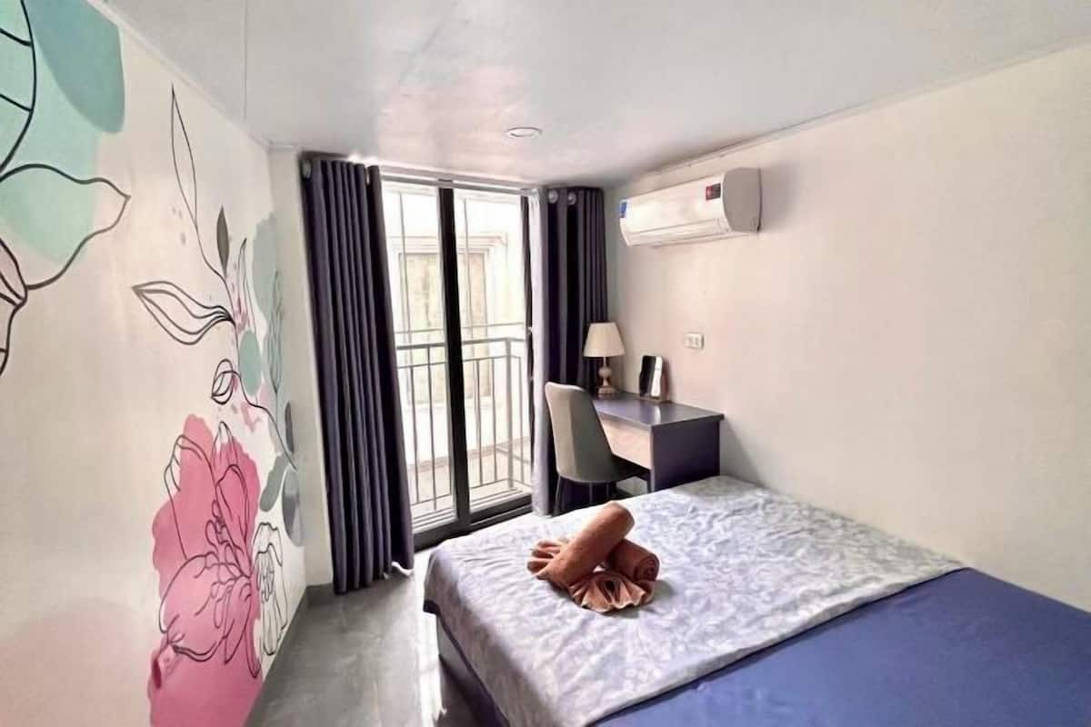 Desk, laptop workspace, blackout curtains, soundproofing